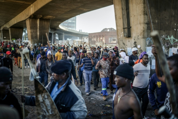 Manifestation du mouvement March and March pour le départ d'Afrique du Sud des étrangers en situation irrégulière, le 30 juin 2026 à Durban  ( AFP / EMMANUEL CROSET )