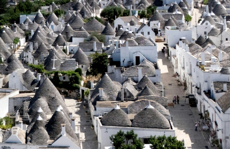 Des trulli à Alberobello, en Italie, le 24 juin 2026 ( AFP / Tiziana FABI )