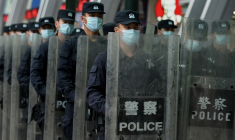 Des policiers chinois à Shenzhen, en septembre 2021 (illustration) ( AFP / NOEL CELIS )