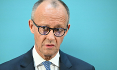 Le chancelier allemand Friedrich Merz devant la presse, le 29 juillet 2026 à Berlin ( AFP / RALF HIRSCHBERGER )