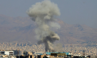 Explosion dans le centre de Téhéran, le 15 juin 2025 ( AFP / Atta KENARE )
