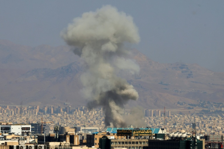 Explosion dans le centre de Téhéran, le 15 juin 2025 ( AFP / Atta KENARE )