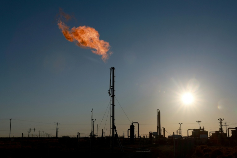 Dans l'industrie pétrogazière, le méthane s’échappe par des fuites au niveau de vannes, de gazoducs, lors d'opérations de dégazage direct dans l'air ou de torchage inefficace (combustion incomplète du gaz) sur des installations ( GETTY IMAGES NORTH AMERICA / JOE RAEDLE )