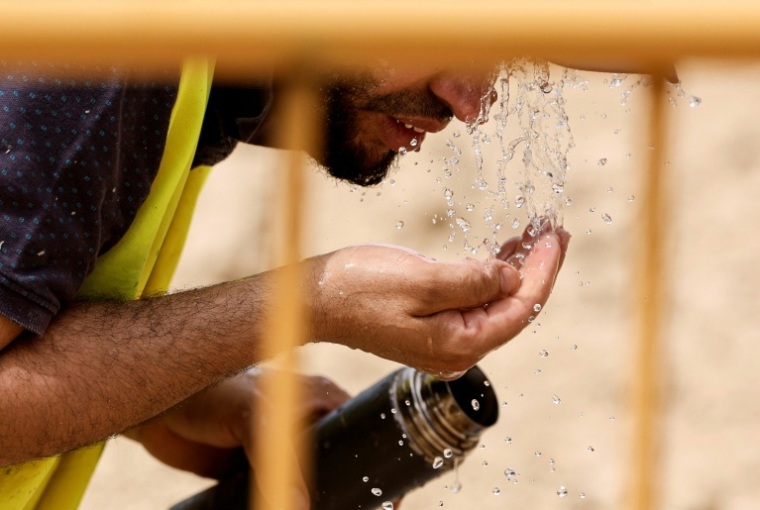 Un ouvrier sur un chantier à Madrid, le 22 juin 2026 ( AFP / OSCAR DEL POZO )