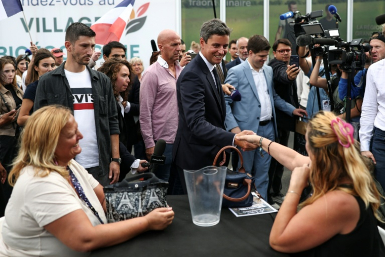 Le candidat Renaissance à l'élection présidentielle Gabriel Attal en visite à la foire de Châlons-en-Champagne, dans la Marne, le 30 août 2026 ( AFP / Sameer AL-DOUMY )