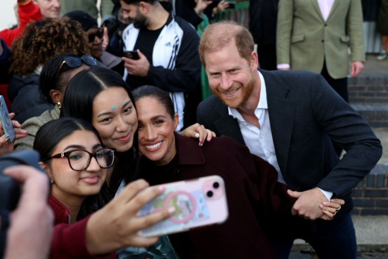 Le prince Harry et son épouse Meghan, duc et duchesse de Sussex, lors d’une visite à Nottingham, le 15 octobre 2026 dans le centre de l’Angleterre ( AFP / Darren Staples )