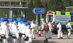 Hong Kong: les équipes d'identification des victimes pénètrent dans le lotissement incendié