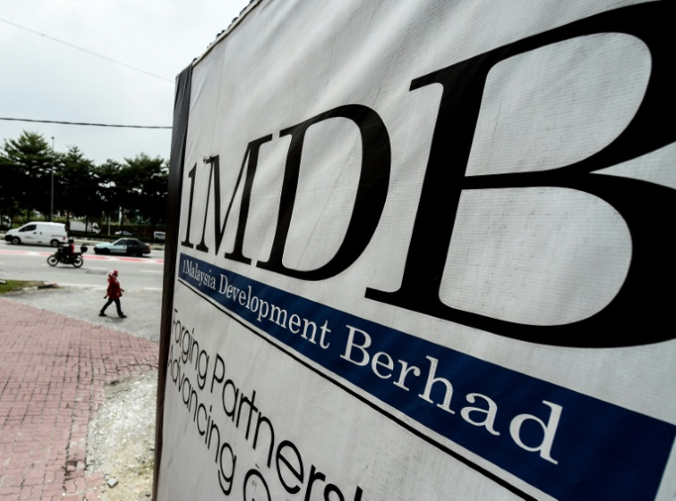 Panneau d'affichage de l'ancien fonds souverain 1MDB, le 22 septembre 2015 à Kuala Lumpur ( AFP / MANAN VATSYAYANA )