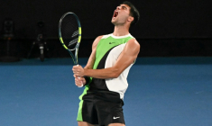 Carlos Alcaraz qualifié sans trembler contre l'Australien Adam Walton à Melbourne le 18 janvier 2026  ( AFP / Paul Crock )