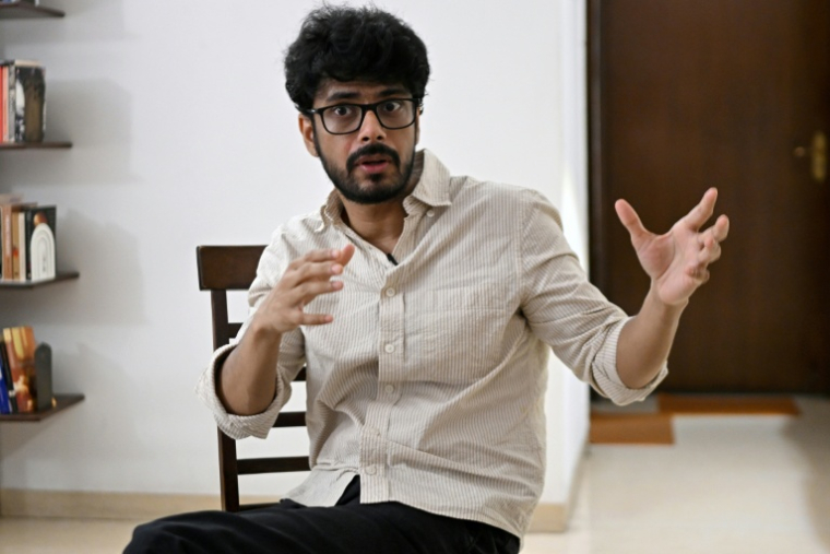 Le réalisateur indien Shaunak Sen chez lui à New Delhi, le 12 août 2026 ( AFP / Arun SANKAR )