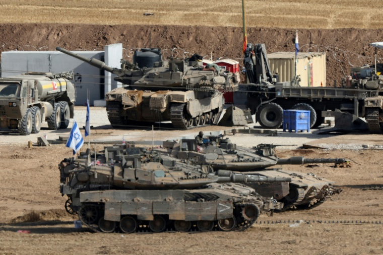 Des troupes israéliennes déployées à la bordure de la bande de Gaza, où Israël a intensifié son offensive, le 20 mai 2025 ( AFP / Jack GUEZ )