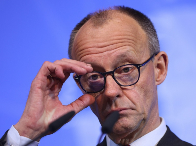 Le chancelier allemand Friedrich Merz lors du sommet de la mer du Nord sur l'énergie, le 26 janvier 2026, à l'hôtel de ville de Hambourg, en Allemagne ( AFP / Ronny HARTMANN )
