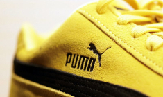 Un logo Puma est visible sur une basket Puma Speedcat OG