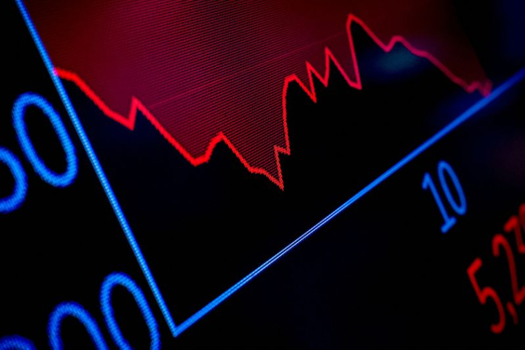 Des traders travaillent sur le parquet de la Bourse de New York, aux États-Unis