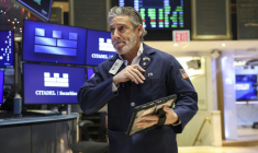 Un opérateur à la Bourse de New York le 5 décembre 2025 ( AFP / ANGELA WEISS )