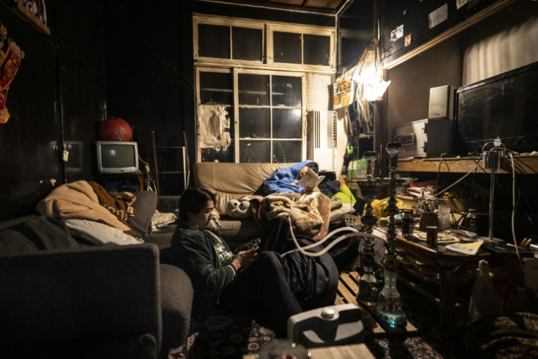Des étudiants résidents du Foyer Yoshida de l'Université de Kyoto, le 4 février 2026 au Japon ( AFP / Yuichi YAMAZAKI )