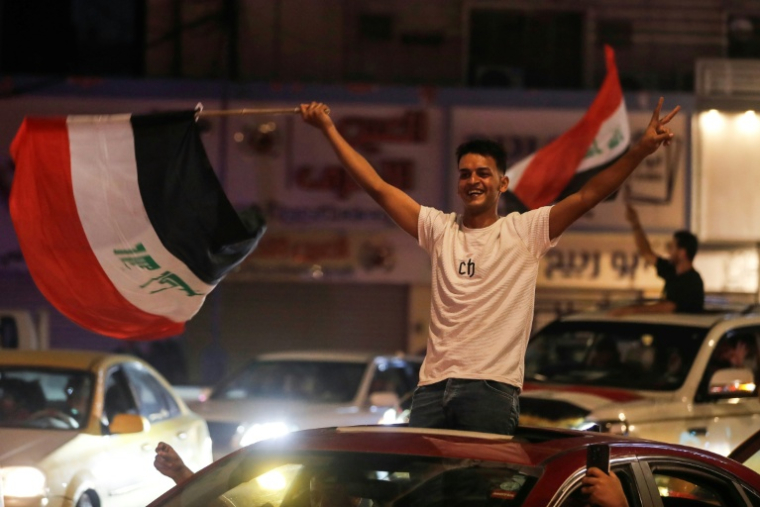 Les partisans du Premier ministre irakien sortant Mohamed Chia al-Soudani célèbrent la victoire de sa coalition aux législatives irakiennes le 12 novembre 2025 à Bagdad. ( AFP / AHMAD AL-RUBAYE )