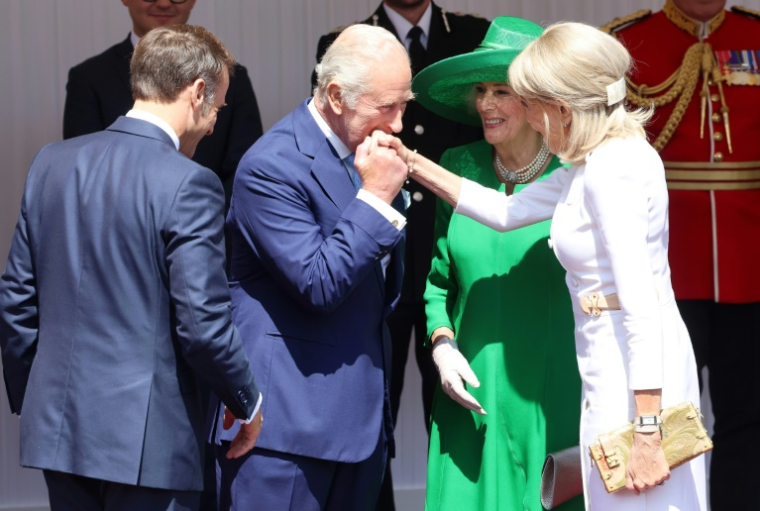 Le roi Charles III et la reine Camilla accueillent le président Emmanuel Macron et son épouse Brigitte lors de la première visite d'Etat au Royaume-Uni d'un président français en 17 ans, le 8 juillet 2025 ( POOL / Chris Jackson )