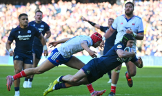 L'alier écossais Darcy Graham marque un essai contre la France, au stade de Murrayfield à Edimbourg, lors du Tournoi des six nations le 7 mars 2026  ( AFP / ANDY BUCHANAN )