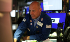 Un opérateur à la Bourse de New York le 14 juillet 2026 ( AFP / TIMOTHY A. CLARY )