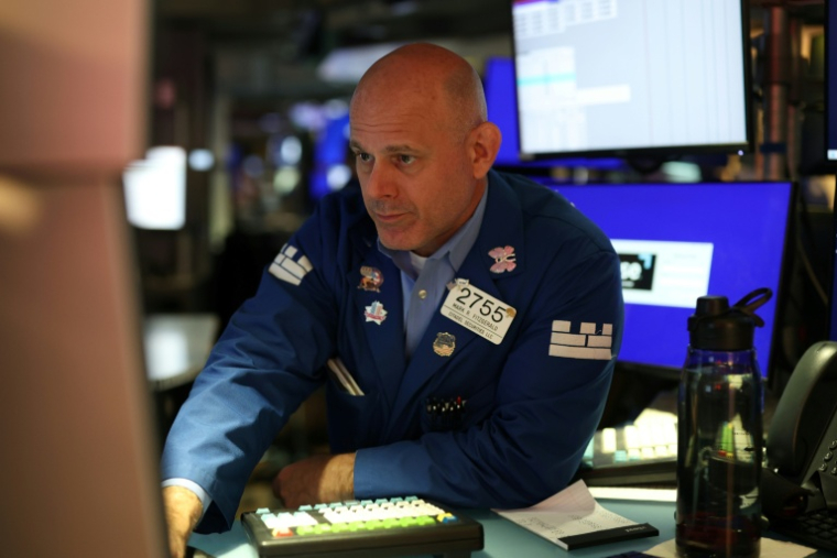 Un opérateur à la Bourse de New York le 14 juillet 2026 ( AFP / TIMOTHY A. CLARY )