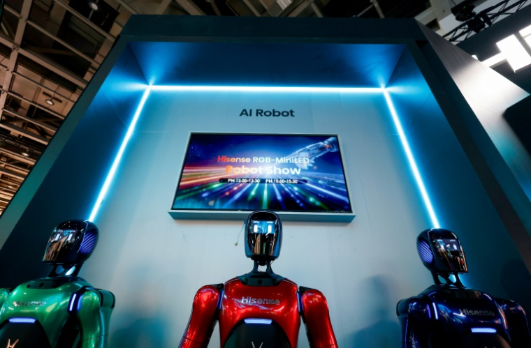 Des robots exposés sur le stand du fabricant d'électronique chinois Hisense au salon de l'électronique IFA à Berlin, le 5 septembre 2025 ( AFP / Odd ANDERSEN )