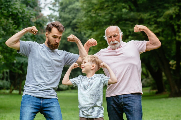 (Crédits photo : Adobe Stock - Trois générations de champions célébrant ensemble la fête des pères)