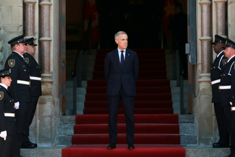 Le Premier ministre du Canada, Mark Carney, participe à une cérémonie au Parlement du Canada, le 24 septembre 2026, à Ottawa ( AFP / Dave Chan )