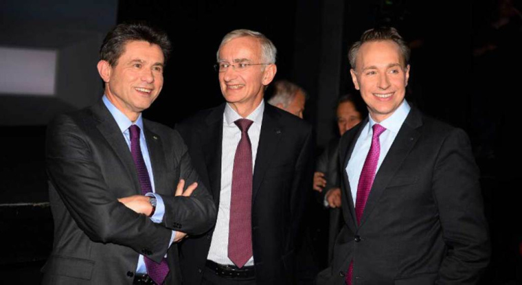 En organisant son départ deux années avant le terme de ses fonctions, Henri de Castries a le souci d'ancrer le changement à la tête groupe. Sa succession sera assurée par le tandem Denis Duverne (m.)-Thomas Buberl (d.). (© E. Piermont / AFP)