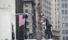Des ferrailleurs travaillent sur le site du Four World Trade Center à New York