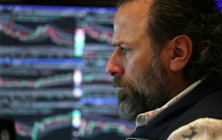 Un opérateur à la Bourse de New York le 10 décembre 2025 ( AFP / TIMOTHY A. CLARY )