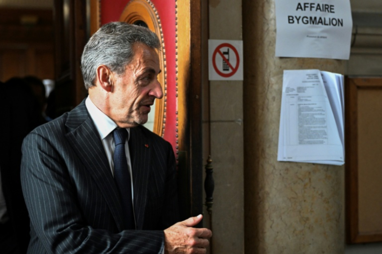 L'ancien président Nicolas Sarkozy quitte le palais de justice de Paris après le verdict de son procès en appel dans l'affaire Bygmalion, le 14 février 2024 ( AFP / Bertrand GUAY )