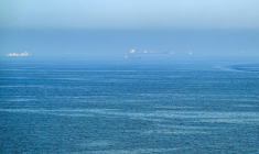 Des navires dans le golfe d'Oman au large des côtes de Sharjah, aux Emirats arabes unis, le 19 juin 2026  ( AFP / - )