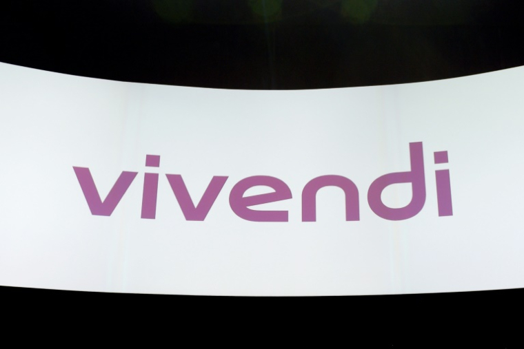 A la Bourse de Paris, le cours de l'action Vivendi a terminé en forte hausse de 13,26% à 3,33 euros, les actionnaires s'attendant à bénéficier d'une prime au moment de l'offre ( AFP / ERIC PIERMONT )