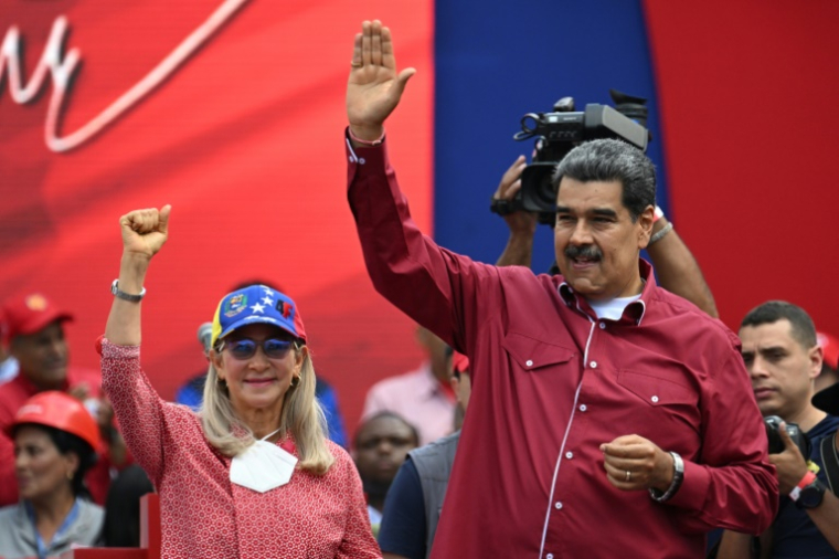 Le président vénézuélien Nicolas Maduro (d) et sa femme Cilia Flores lors d'un rassemblement à Caracas, le 1er mai 2023 ( AFP / Federico Parra )