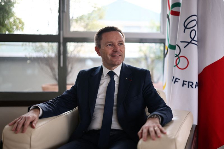 David Lappartient, président du Comité olympique français et de l'Union cycliste internationale, pose à Paris