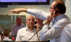 Les traders de BGC, une société de courtage internationale située dans le centre financier Canary Wharf à Londres