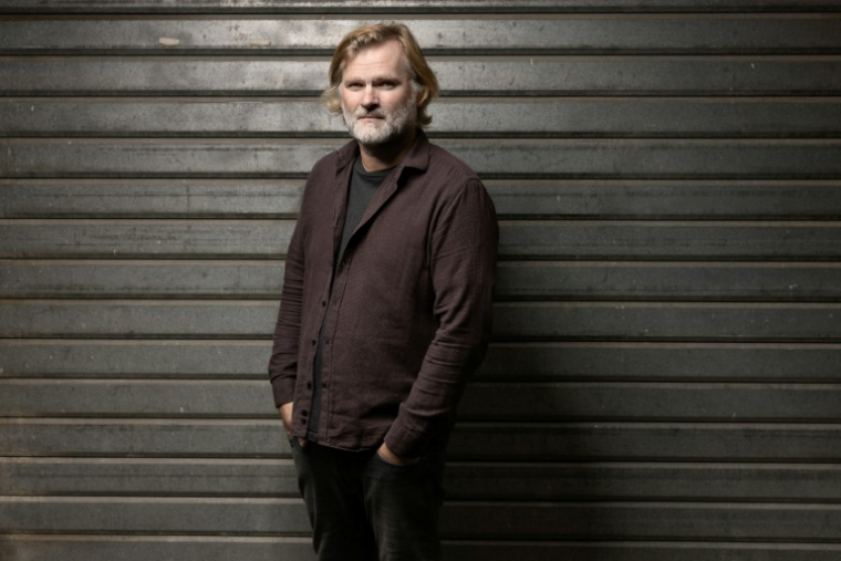 Le romancier Olivier Adam lors du festival de littérature "Les Correspondances" à Manosque, le 25 septembre 2025 dans les Alpes-de-Haute-Provence ( AFP / JOEL SAGET )