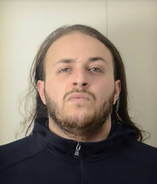 Badiss Mohamed Amide Bajjou, un Franco-Marocain de 24 ans arrêté au Maroc, soupçonné d'avoir commandité une série d'enlèvements visant des entrepreneurs du secteur des cryptomonnaies en France - photographie obtenue le 4 juin 2025 par Interpol ( INTERPOL / Handout )