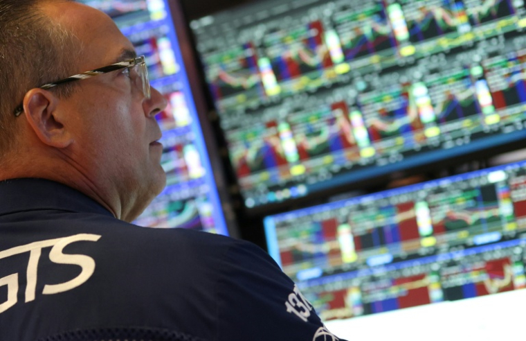 Un opérateur à la Bourse de New York, le 14 juillet 2026 ( AFP / TIMOTHY A. CLARY )