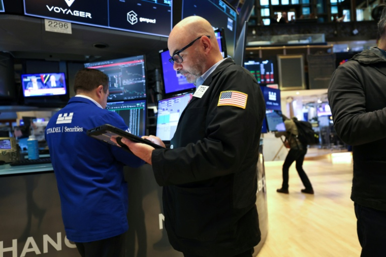 A la Bourse de New York, le 13 octobre 2025 ( AFP / TIMOTHY A. CLARY )