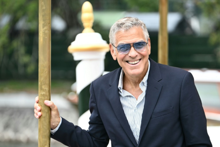 L'acteur américain George Clooney arrive à la 82e Mostra de Venise, le 27 août 2025 ( AFP / Stefano RELLANDINI )