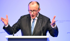 German Chancellor Friedrich Merz delivers a speech at the annual reception of the stock exchange operator Deutsche Boerse in Eschborn, western Germany, on February 2, 2026.  ( AFP / Kirill KUDRYAVTSEV )
