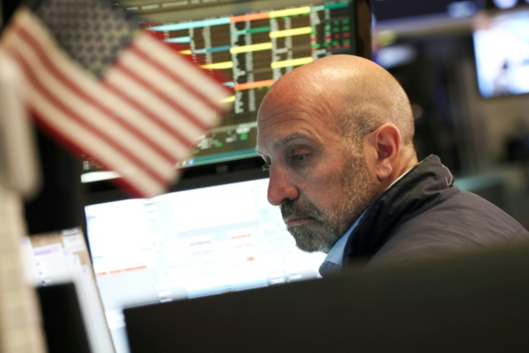 Un opérateur à la Bourse de New York le 4 août 2026 ( AFP / TIMOTHY A. CLARY )