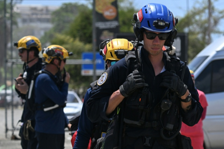 Des secouristes américains à Caraballeda, dans l'État de La Guaira, après deux séismes meurtriers, le 29 juin 2026 au Venezuela ( AFP / Juan BARRETO )