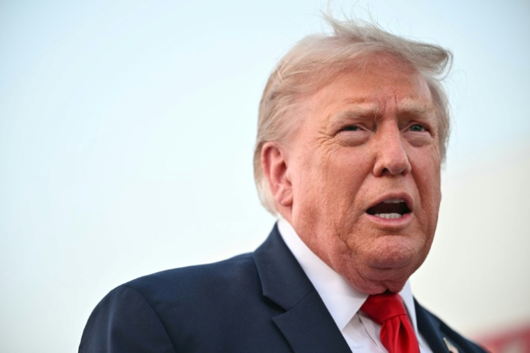 Le président américain Donald Trump à la base aérienne Andrews, dans l'Etat américain du Maryland, le 19 juillet 2026 ( AFP / Mandel NGAN )