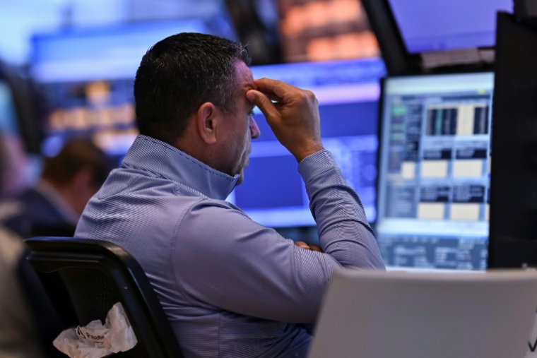 Un opérateur à la Bourse de New York, le 12 mai 2025. ( AFP / ANGELA WEISS )