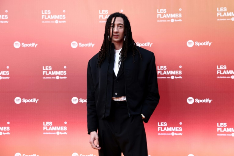 Le rappeur et chanteur italo-tunisien Ghali arrive à une cérémonie à La Seine Musicale à Boulogne-Billancourt, près de Paris, le 13 mai 2025 ( AFP / Thibaud MORITZ )