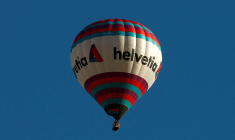 FILE PHOTO: The logo of Swiss Helvetia Insurance is seen on a hot air ballon floating near Romanshorn
