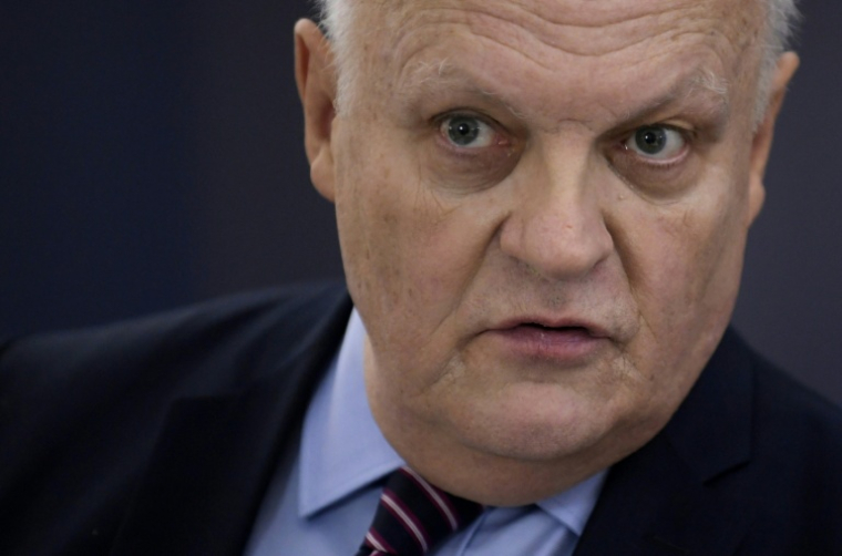 Le président de l'Union populaire républicaine (UPR), François Asselineau, le 19 octobre 2021 à Paris ( AFP / Julien DE ROSA )